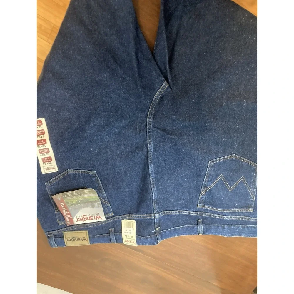 Wrangler Rugged Wear Jeans Mens 56 X 34 Blue Denim Relaxed Fit NWT